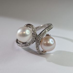18ct white gold diamond swirl ring with pearls