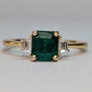 18ct yellow gold emerald and diamond ring