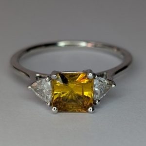 Platinum yellow sapphire and diamond ring