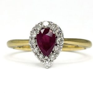 18ct yellow gold pear ruby with diamond surround ring